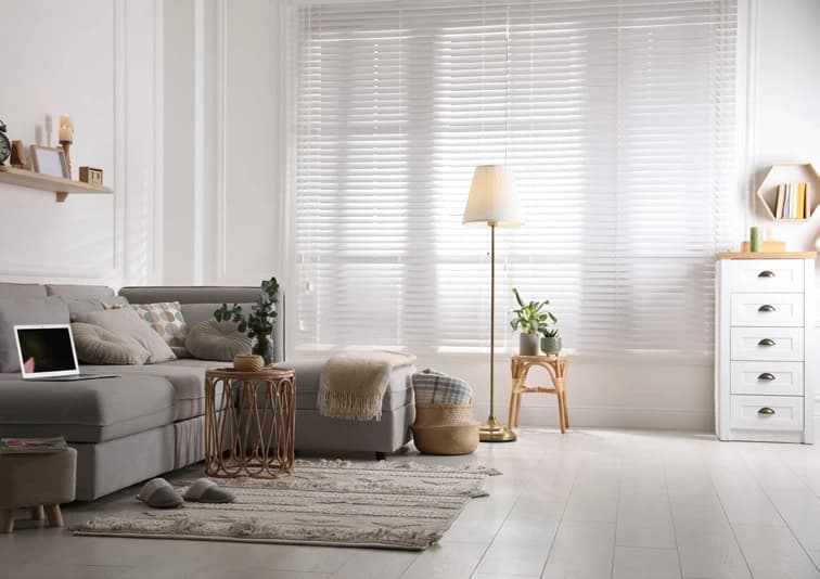 Living room with custom white venetian blinds